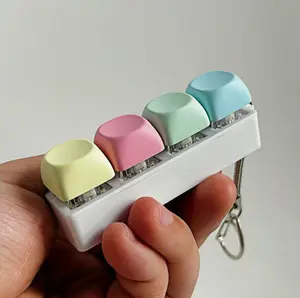 Keyboard-Style Fidget Toy Keychain Ultra-Refined Design with 4 & 9 Keys Durable Eco-Friendly Silicone & ABS Material for Adults Relaxation & Tactile Feedback Everyday Gift