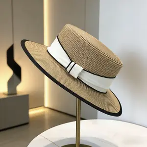 New French-style flat-top straw hat for women, summer straw woven hat, fashionable and simple style, beach hat, British style sun hat - perfect gift and fashion accessory.