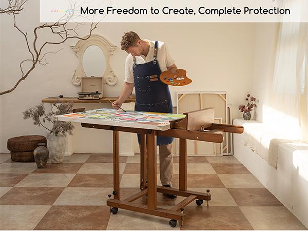 MEEDEN Painting Apron for Men Women: Adjustable Cross Back Waterproof Polyester Canvas Art Apron with 3 Pockets - Artist Apron for Acrylic Oil & Watercolor Painting, Gardening, Cooking