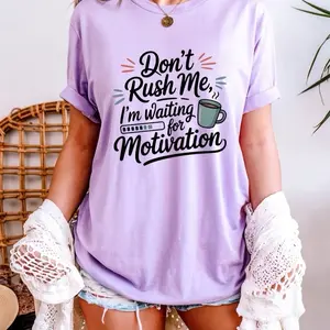 Don’t Rush Me, I’m Waiting for Motivation Graphic Tee  Slow down… motivation iGraphic DTF T-Shirt. Designed with soft pastel tones and delicate floral patterns, this elegant bunny ear bow design adds a playful yet stylish touch to your seasonal wardrobe.