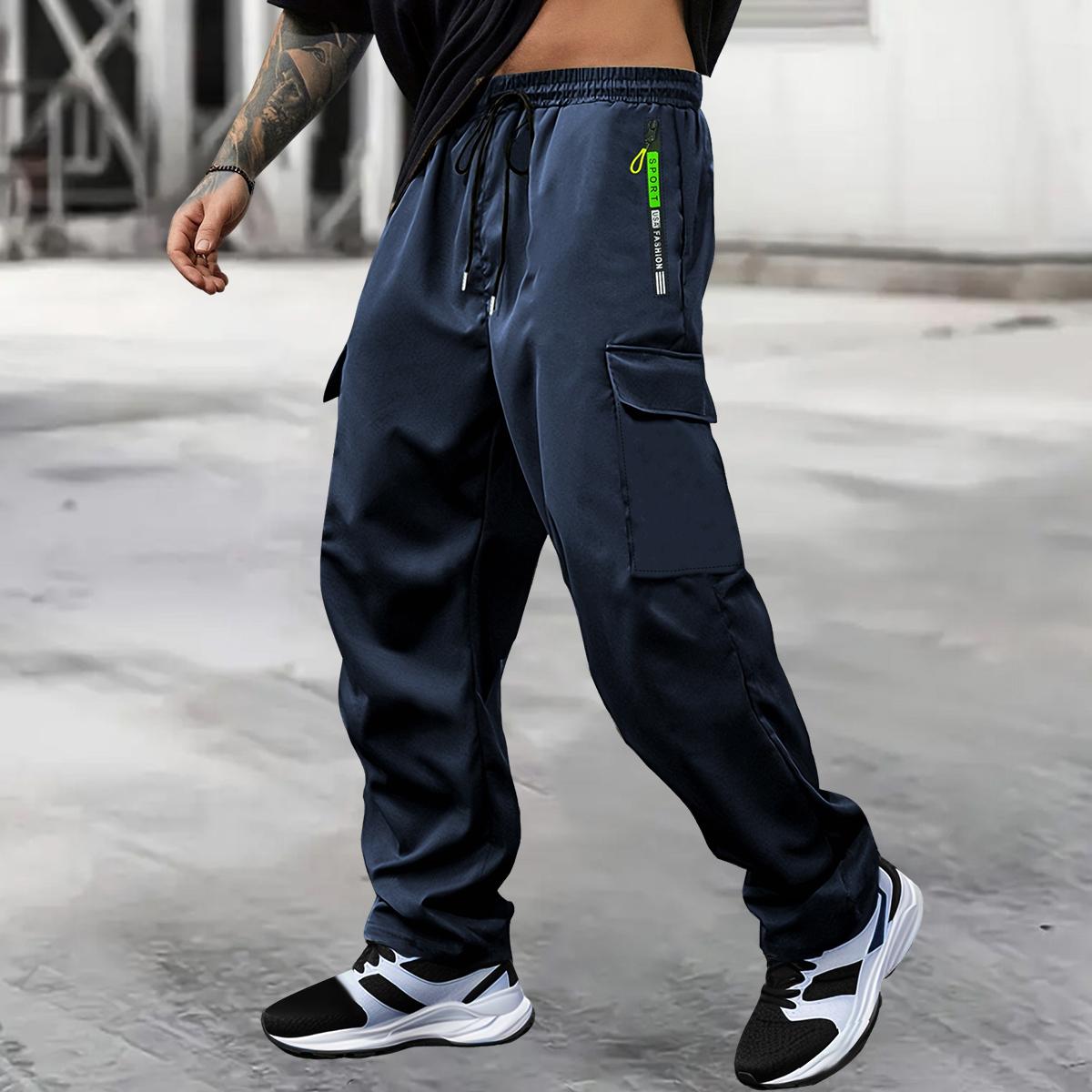 Men's spring-autumn style letter green zipper pocket work pants with fashionable large patch pocket design with drawstring elastic waist, suitable for jogging, hiking and daily wear. Valentine's Day gift.