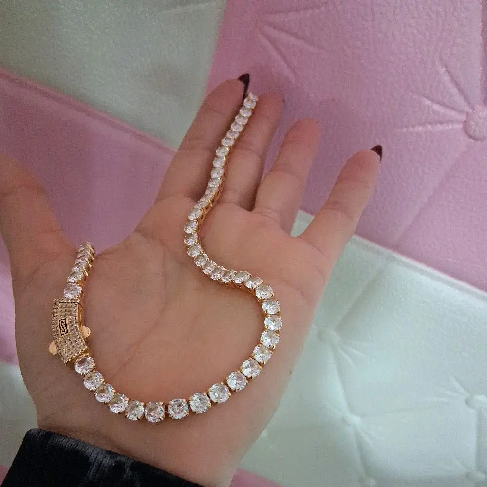 Trendy chain 5mm thich amd  16 inches long withwhite  stones  box clasp .