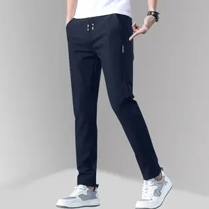 Men’s casual business pants made from lightweight, stretchy fabric with straight legs and a regular fit. Comfortable, breathable athletic pants with pockets—all-season men’s long pants.