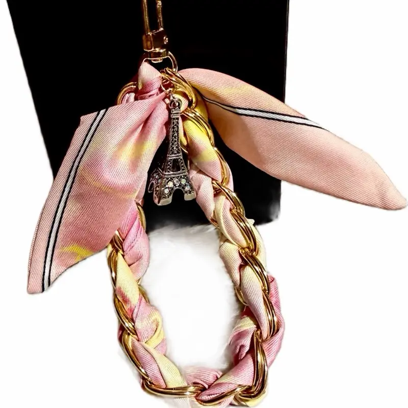 Twilly chain fashion phone wristlet with Eiffel Tower accent charm