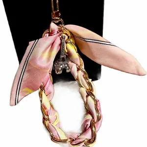 Twilly chain fashion phone wristlet with Eiffel Tower accent charm