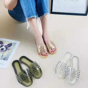 Women's jelly slippers - Transparent PVC comfortable rhinestone beach shoes with rivet design