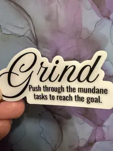 Sticker- "Grind- Push through the mundane tasks to reach the goal"