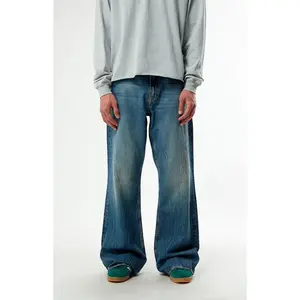 GUESS Originals Men's TintedÂ StretchÂ Medium Blue Bootcut JeansÂ