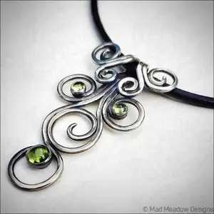 Sterling Silver Fiddlehead Swirl Necklace with Green Peridot Gemstones