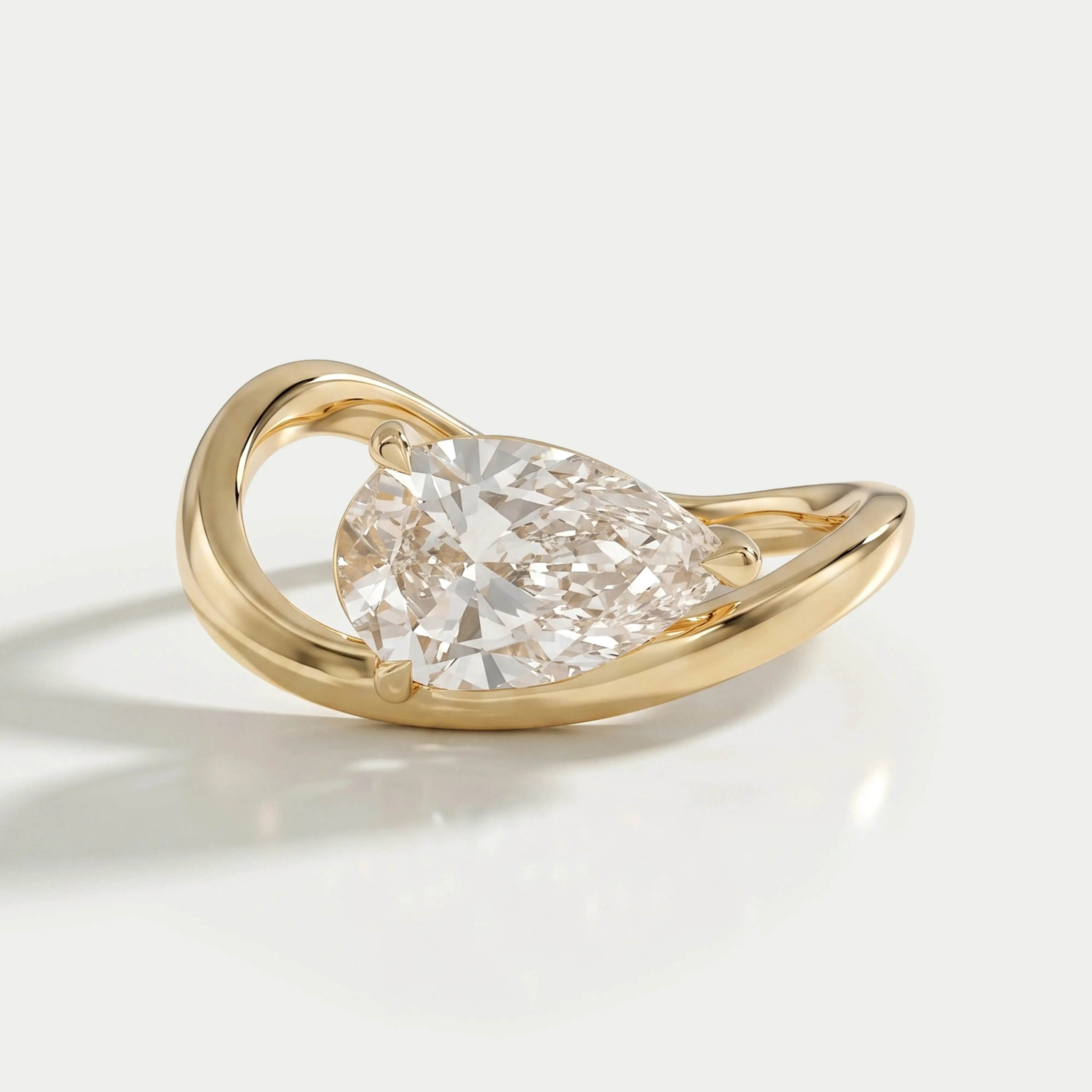 Pear Diamond Curved Solitaire Engagement Ring