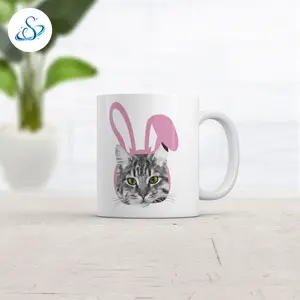 Easter Cat Mug Funny Easter Sunday Graphic Coffee Cup - 11oz Funny Coffee Mugs Ceramic Printed Drinkware Cup,Cute Cat with Bunny Ears Coffee Mug, Easter Bunny Cat Graphic Cup, Funny Easter Sunday Coffee Mug, Cat Lover Easter Gift, Adorable Pet Lover Mug