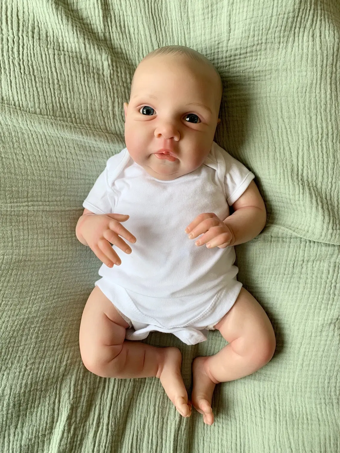 20-Inch Unisex Reborn Baby Doll, Lifelike Cloth & Vinyl Body with Drawing Hair, Some Nails, Poseable Arms, Role Play Toy Gift for Ages 3+, Lifelike Realistic Newborn, Some Nails Life-Like
