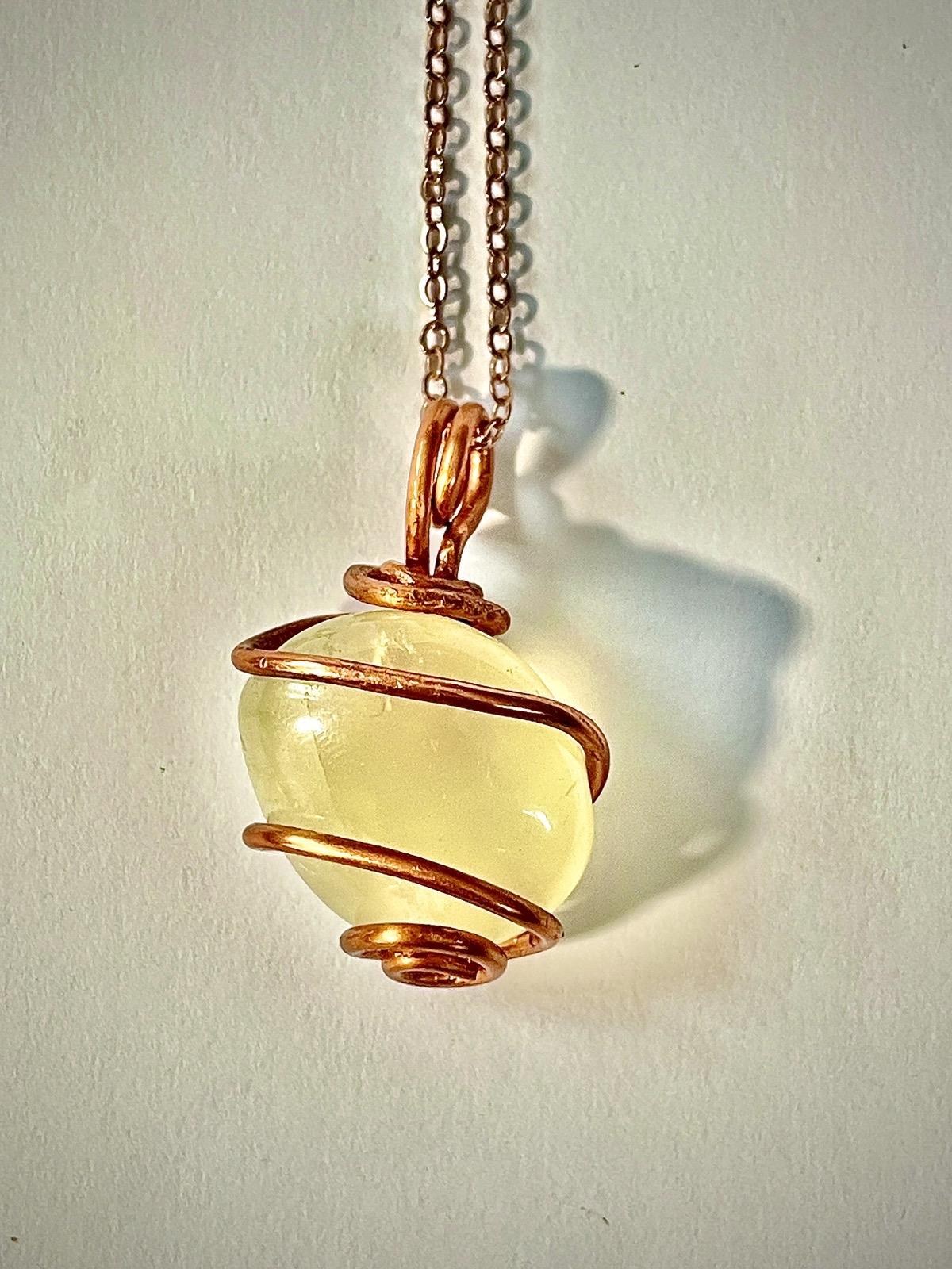 Citrine Crystal Pendant wrapped in pure copper wire, on a rose gold plated copper necklace.