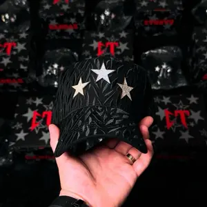 3 Estrellas Black Quilted Hat with Gold and Silver Stars for Stylish Outfits