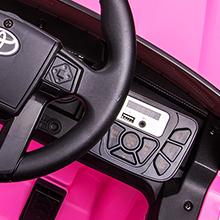 GARVEE Explore the GARVEE 12V Toyota Tacoma Ride-On Car, featuring spring suspension and vibrant LED lights, available in Pink, Black, White, and Red, perfect for adventurous young drivers.