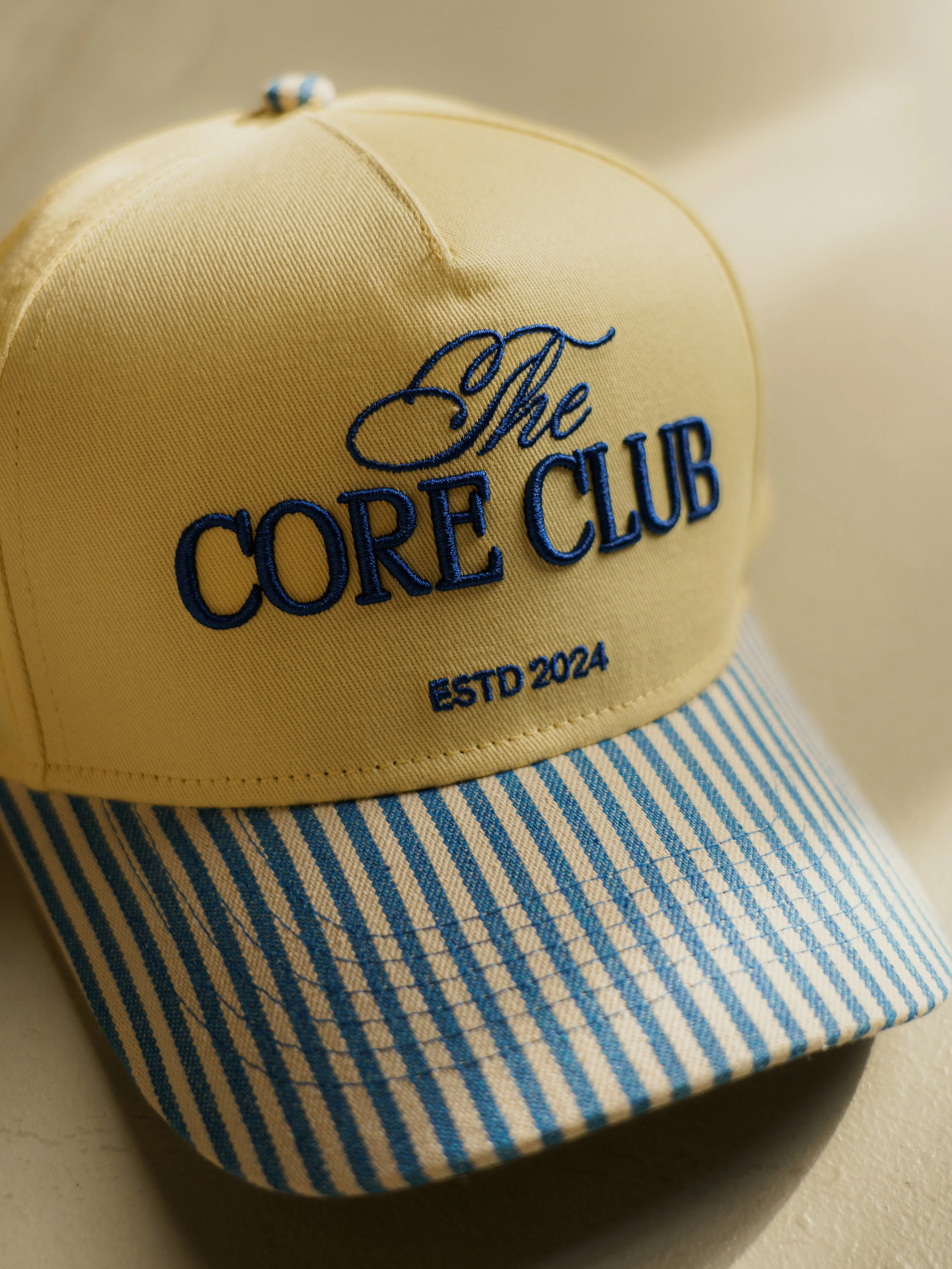 TCC Blue & Yellow Stripe Baseball Hat | Pilates Outfit Accessory