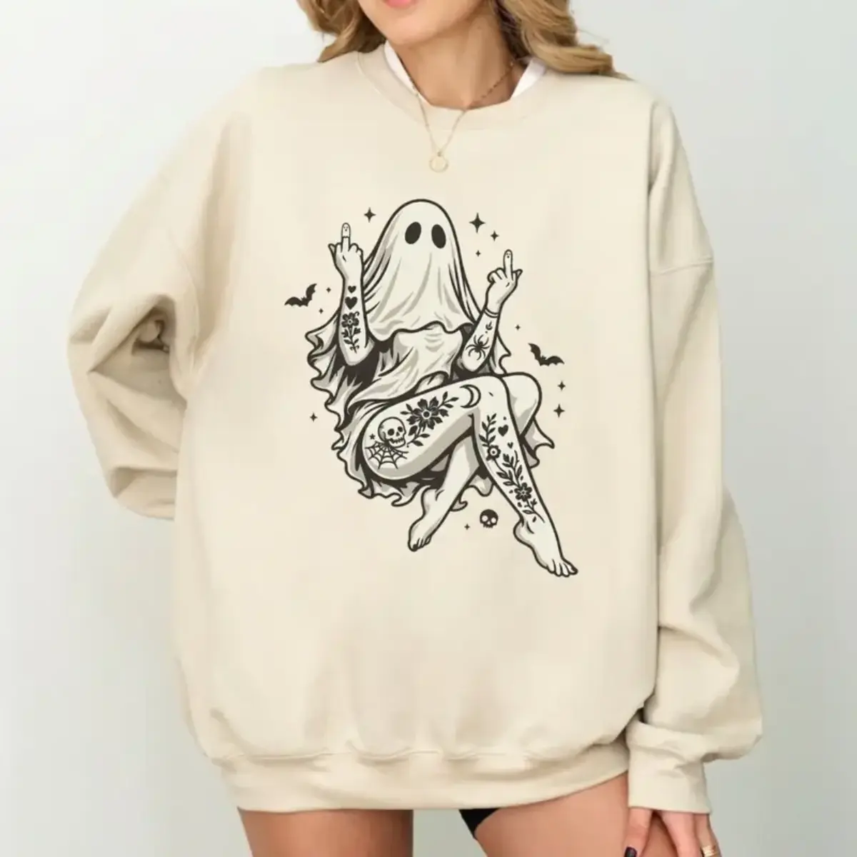 Tattooed Ghost Girl Halloween Sweatshirt - Rebellious Sheet Ghost Woman With Floral Skull Spider Web Heart And Botanical Tattoos Making Bold Hand Gestures , Edgy Spooky Season Crewneck For Women , Gothic Halloween Party Outfit