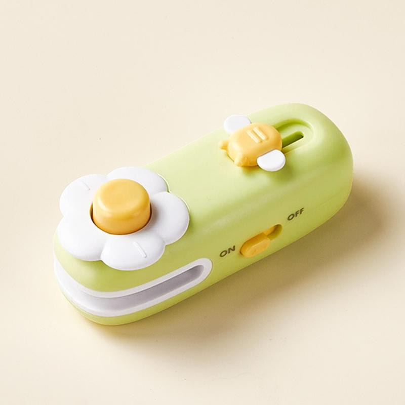 New Flower-Decorated 2-in-1 Sealer and Cutter Portable and compact heat-sealing device ideal for snacks Adorable resealable plastic bag sealer