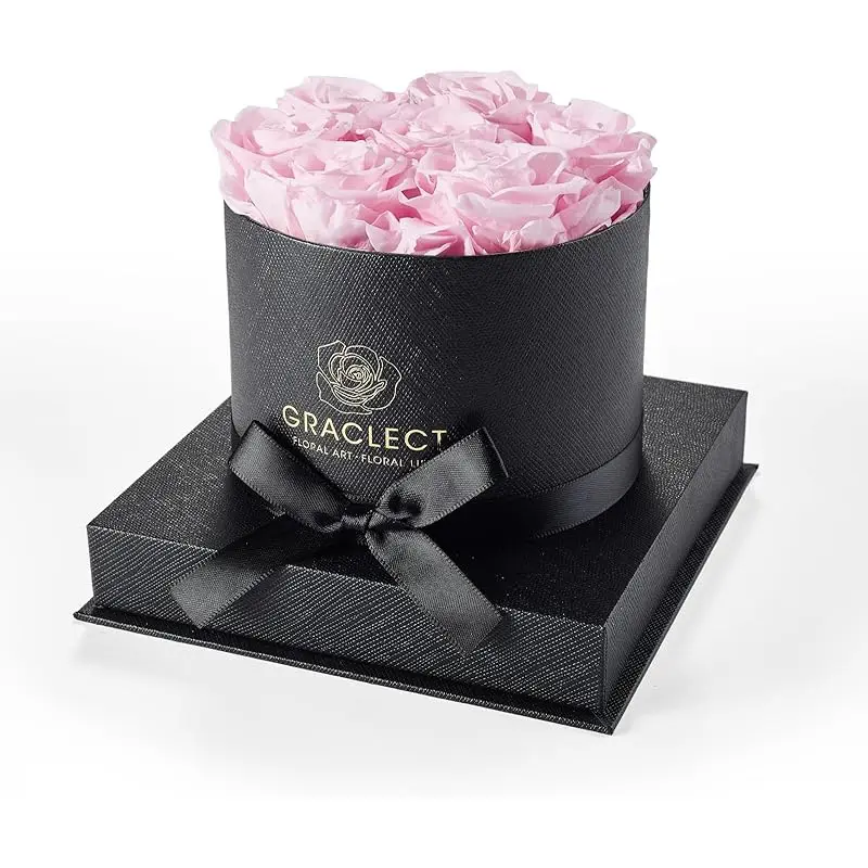 Pink roses in blace box