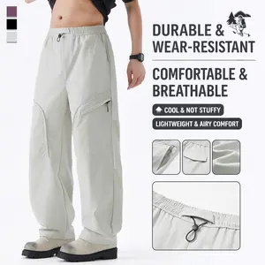 Men’s fashion cargo pants with multiple pockets, a drawstring elastic waistband for easy wear, a loose fit, and a wide-leg length. A versatile gift for family and friends—comfortable, breathable, durable men’s trousers.