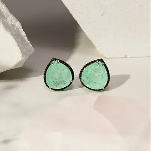 Teardrop earrings with a vibrant emerald-green stone