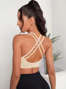 Charm Crisscross Back Sports Bra White Backless Criss-Cross Seamless Yoga Bra Minimal Look Maximum Comfort High-Stretch Fabric Removable Pads