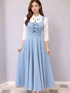 This long jumpsuit with a front tie design is a one-piece garment that combines elegance and comfort.