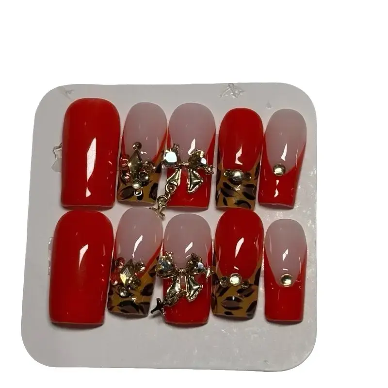 Gorgeous Cheetah Print Nails with Red and Pink Accents and Gold Charms