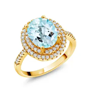 Gem Stone King 18K Yellow Gold Plated Silver Halo Engagement Ring Oval Sky Blue Topaz and Moissanite (2.43 Cttw)