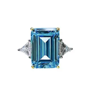 Sky Blue Simulated Diamond Option in Emerald Cut Three Stone Engagement Ring