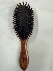 100% boar bristle paddle cushion brush , quality workmanship, light weight, easy brushing by Basic Beauty