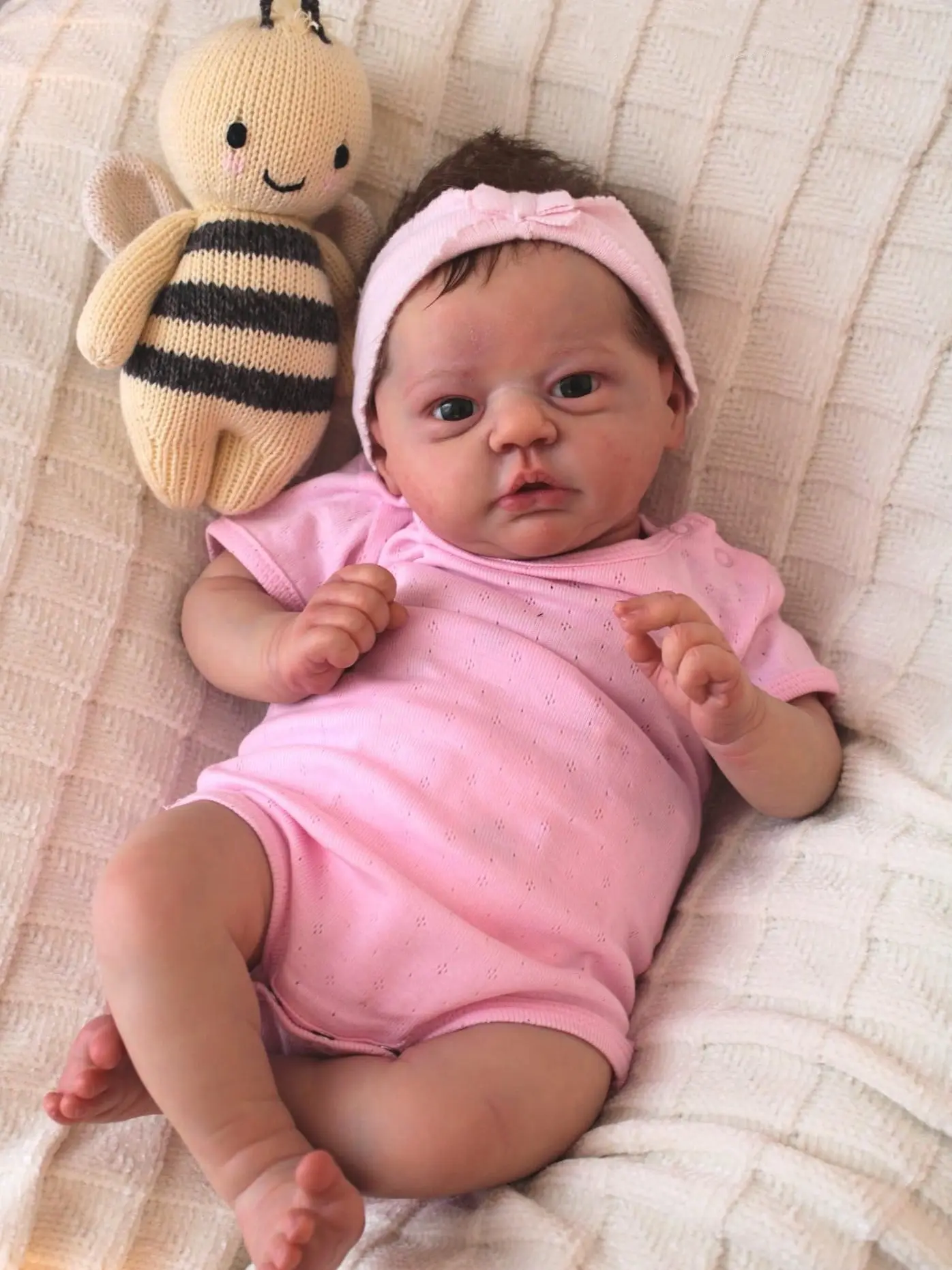 Lifelike Realistic Newborn Baby Doll - 19" (48cm) Character Evi Doll, Brown Hair, Blue Eyes, Soft Body in Pink Onesie, Magnetic Pacifier, Feeding Set, Cuddly Kids' Gift, Newborn Baby Dolls