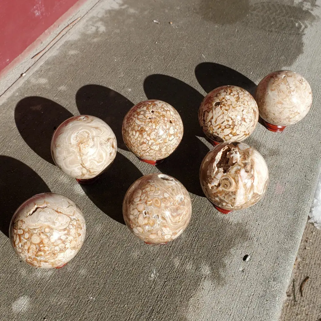 Natural polished Amber Calcite sphere