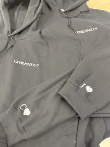 Custom Embroidered Roman Numeral Hoodie with Initial and Heart on Sleeve | Personalized Anniversary Date Couple Sweatshirt | Matching Wedding Date Gift | Premium Gildan Heavy Blend