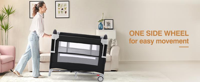 JOYMOR 4 in 1 Pack and Play, Baby Bedside Bassinet, Sturdy Play Yard with Padded Mat and Toy bar with Soft Toys