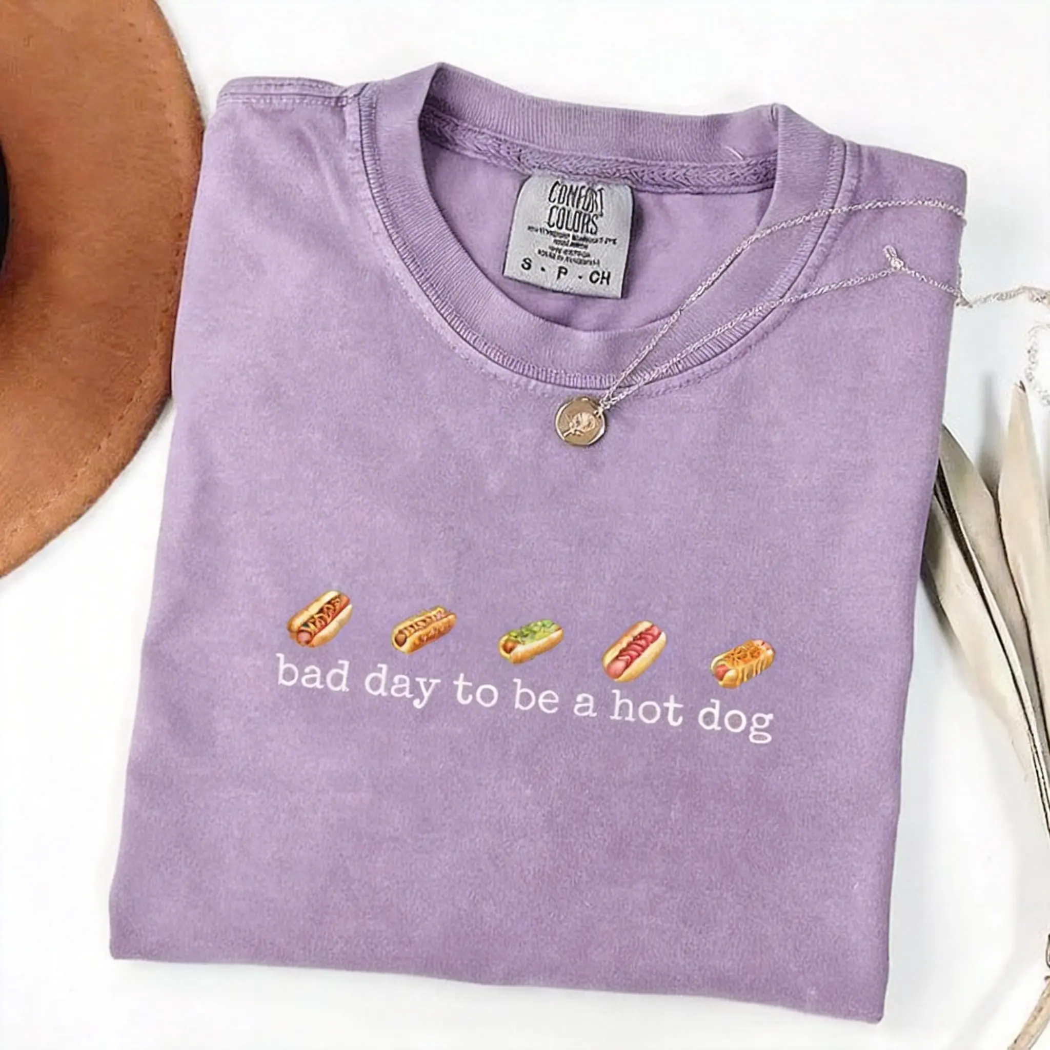Hot dog T-shirt, comfortable colors, "Today is a terrible hot dog day," fun retro hot dog style, unisex T-shirt, anniversary T-shirt, washed and distressed look. graphic
