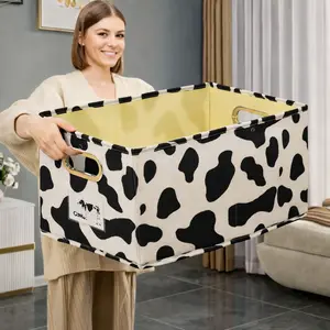 2026 Valentine’s Day Fabric Cow Print Storage Box, 16.9″ × 11.8″ × 10.6″ — New nonwoven fabric with ionic cotton–linen material; PP-board reinforced for a stable shape; foldable design with a strong metal handle; desktop wardrobe storage box ideal for sto