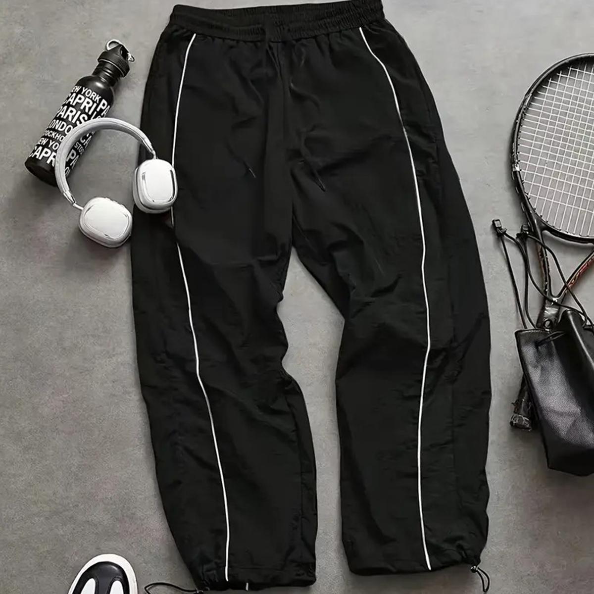 Men's casual athletic pants relaxed fit with drawstring cuffs lightweight fabric perfect for everyday wear