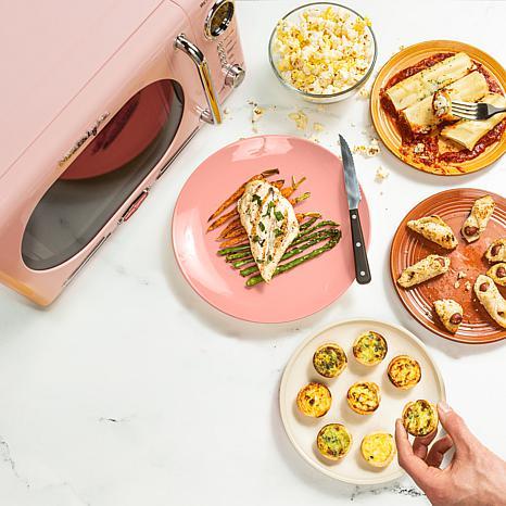 Nostalgia NRMO7PK6A Retro 0.7 CuFt 700-Watt Countertop Microwave, Pink