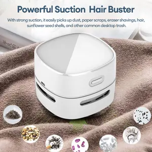 PAXA Desktop mini vacuum cleaner, equipped with a cleaning brush, with strong suction power and long-lasting battery life, suitable for desktop office use.