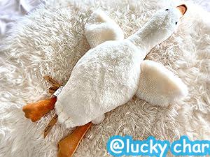 Cute Big White Goose Plush Pillow Toy! Large and irresistibly huggable, it's a favorite for both kids and adults. Suitable for all beds, offering coziness whether you cuddle or clamp it. A practical and sweet sleep companion.