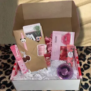 Baddie Blind Date with a Book Hot Girl Edition Featuring Eyelashes Lip Gloss Lip Mask Lash Spoolie Bookmark Lotion Face Mask & More Romance Books Hardcover Soft Cover spicy romance