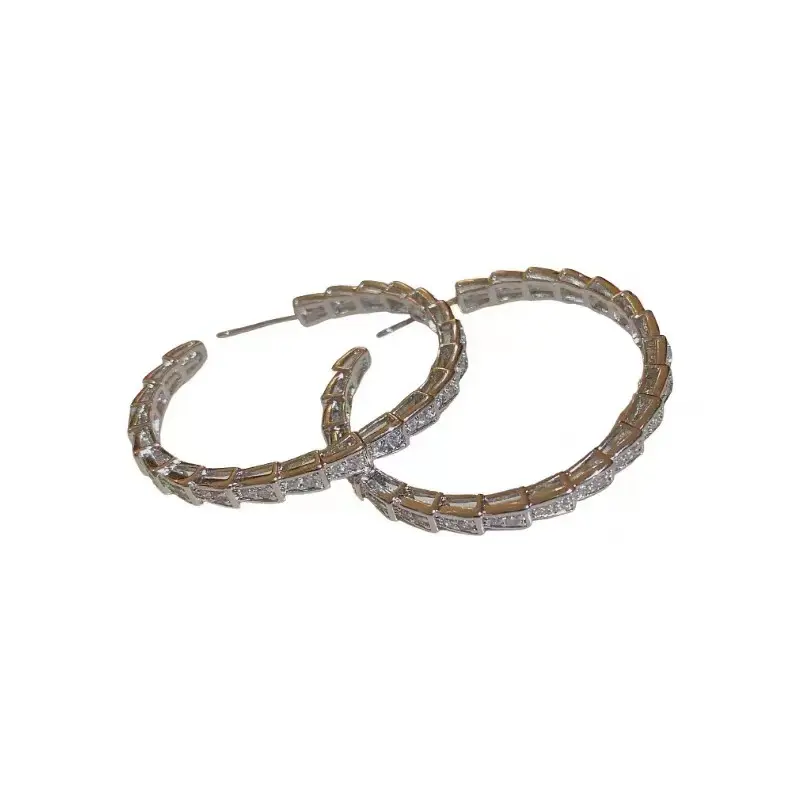 Korean-style niche design earrings with full diamond snake-shaped hoops, offering a light luxury, high-end, and exquisite feel for women