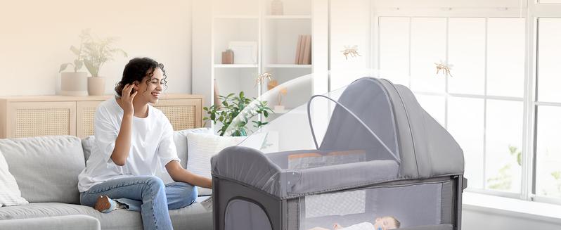 JOYMOR 9 in 1 Bedside Bassinet with Changing Table, Pack and Play with Bassinet, Convert to Rocking Baby Bed with Electric Music Center, Mosquito Net, Toy, Storage