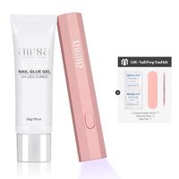 Nail Glue+Pink Handheld UV Lamp (Not the Full Kit)