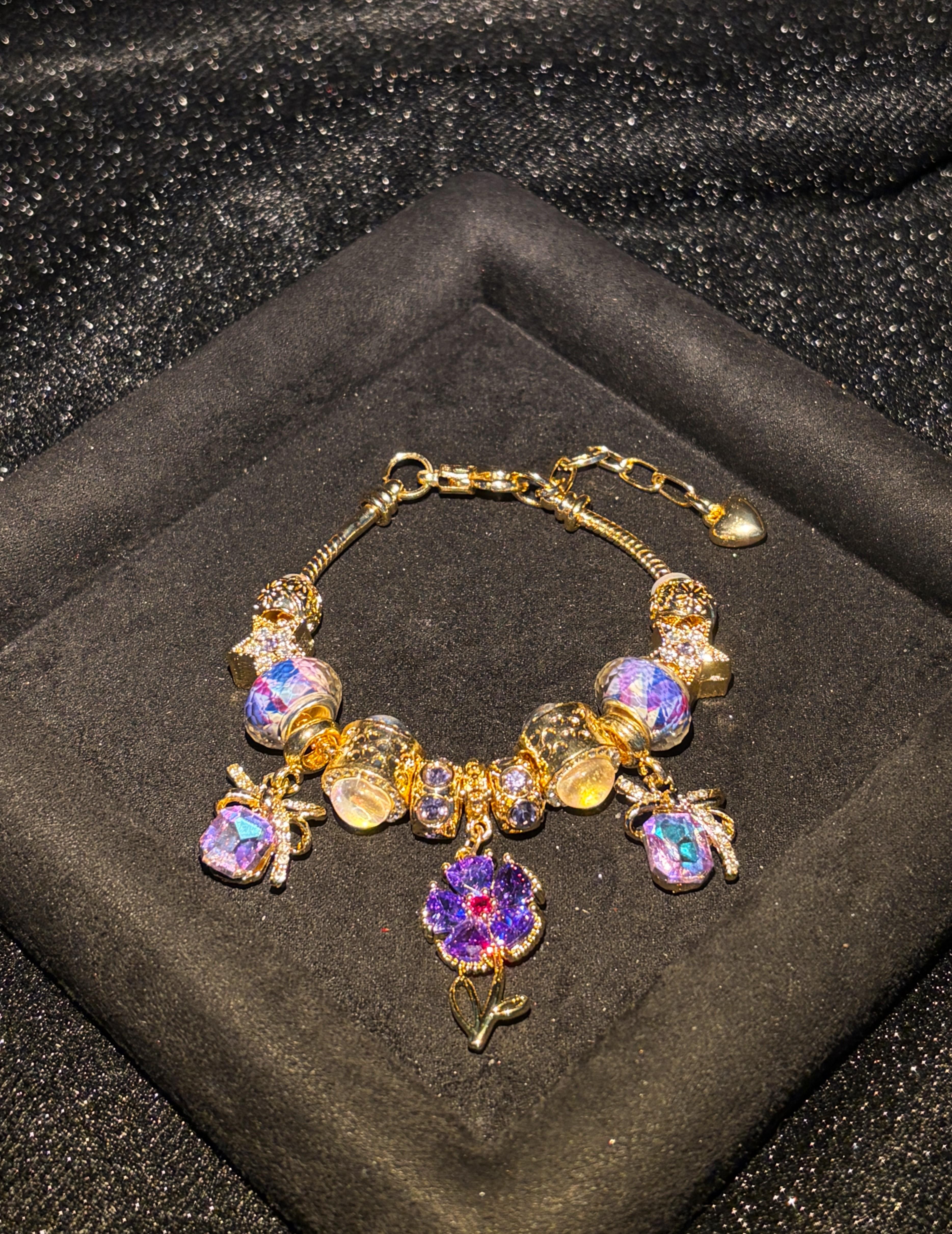 Women's Gold-Tone Purple Flower Charm Bracelet - Iridescent Crystal, Bow Star Pendants, Adjustable Length, Vintage Luxurious Statement Jewelry, Party Ready Costume Accessory Women's Gold-Tone Purple Flower Charm Bracelet - Iridescent Crystal, Bow Star Pendants, Adjustable Length, Vintage Luxurious Statement Jewelry, Party Ready Costume Accessory