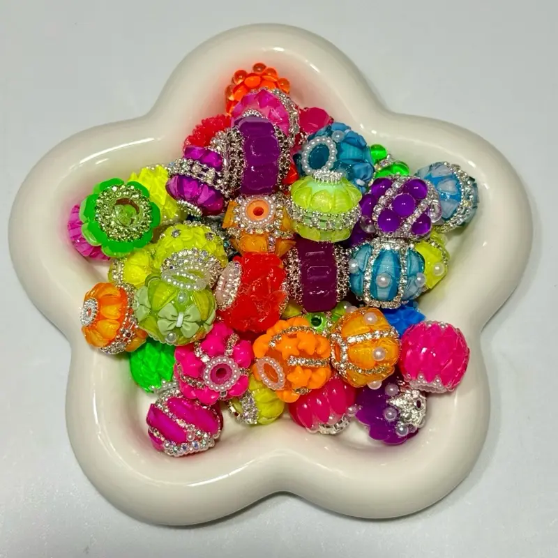 Fancy bead mix for crafting - a variety of sparkling beads that will enhance your projects. You get 10 pieces in each bag.