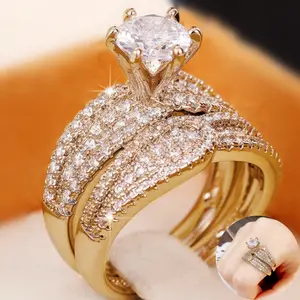 A set of two 14k gold-plated rings adorned with sparkling Cubic Zirconia stones for women, suitable for weddings, engagements, gifts, and parties