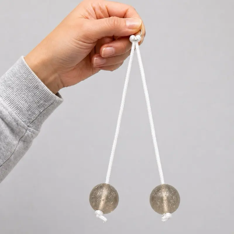 Clacker Balls on a String - Fun Clacking Noise Toy for All Ages - Stress Relief Fidget Toy in Different Colors - Perfect for Kids and Adults