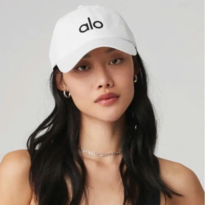 Yoga White Performance District Off-Duty Trucker Hat - 100% Polyester Black Baseball Cap with White Letters, Sun Protection, Durable Woven Minimalist Outdoor Headwear for Running & Activities
